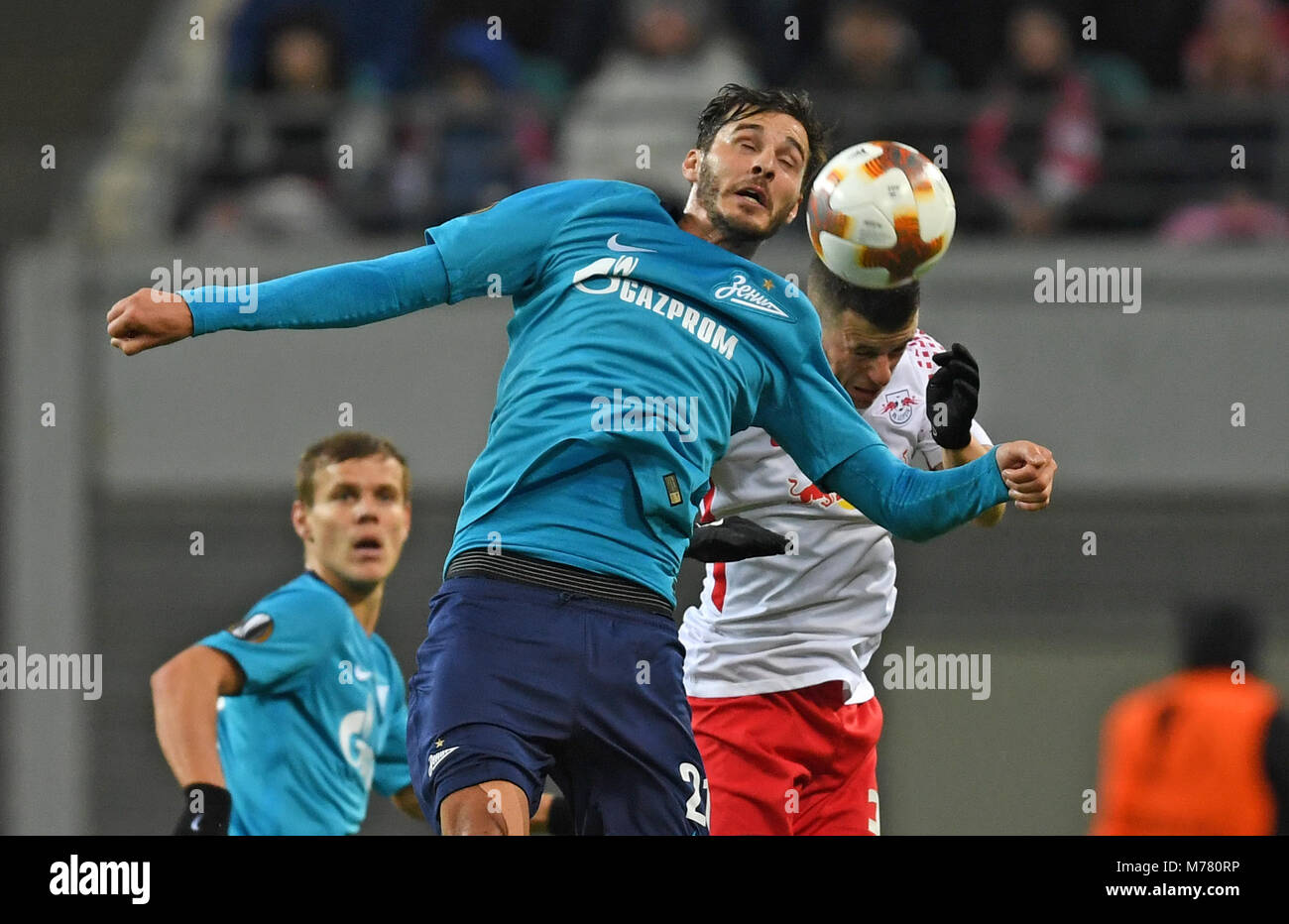 Leipzig, Germany. 08th Mar, 2018. 08 March 2018, Germany, Leipzig: Europa League match between RB Leipzig and Zenit St. Petersburg, Red Bull Arena: Leipzig's Diego Lemme (r) and St. Petersburg's Aleksandr Erokhin vie for the ball. Credit: Hendrik Schmidt/dpa-Zentralbild/dpa/Alamy Live News Stock Photo