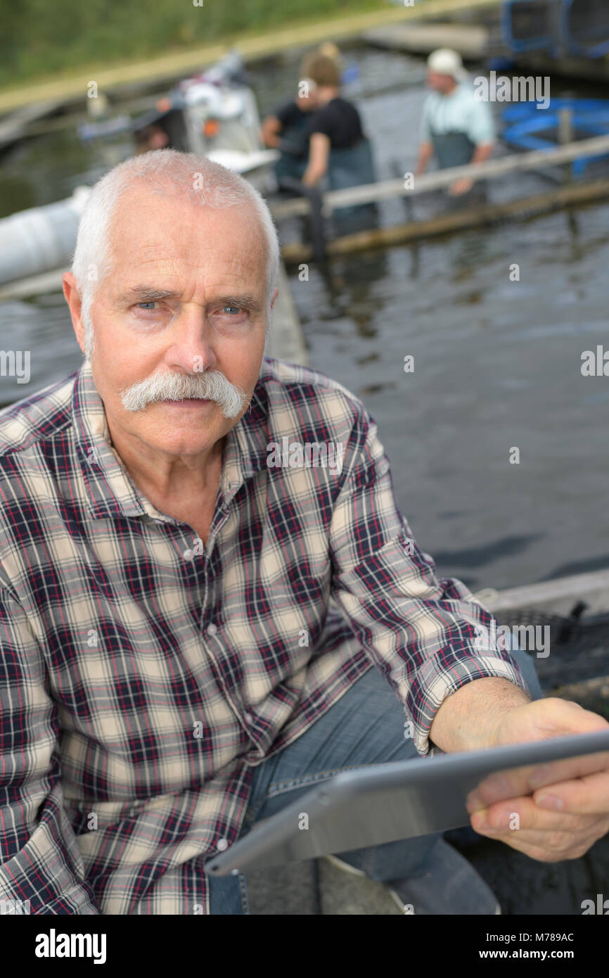 aquaculture owner posing Stock Photo - Alamy