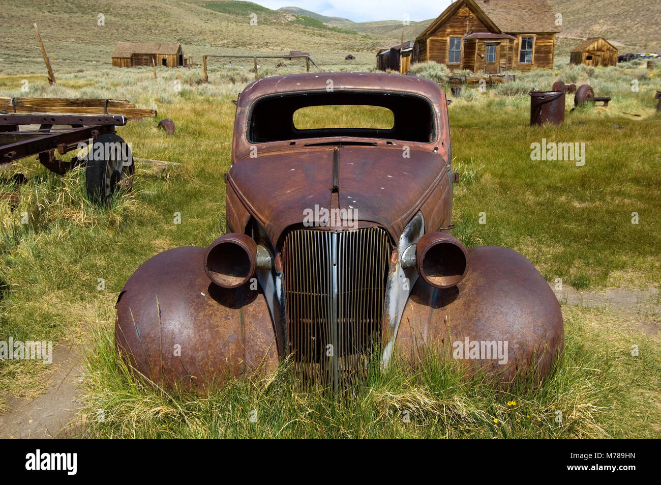 An abandoned 1937 Chevrolet Coupe in ghost town Bodie, in Bodie State Historic Park, CA USA Stock Photo