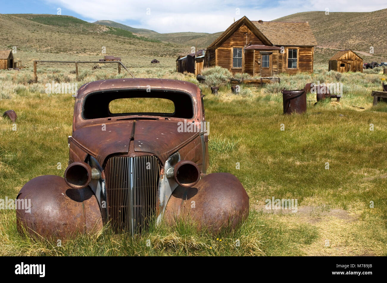 An abandoned 1937 Chevrolet Coupe in ghost town Bodie, in Bodie State Historic Park, CA USA Stock Photo