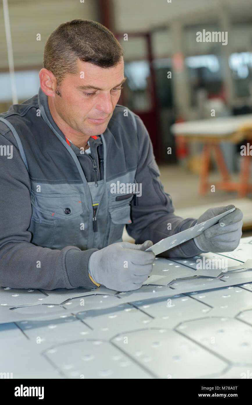 happy senior machinist in workshop Stock Photo - Alamy