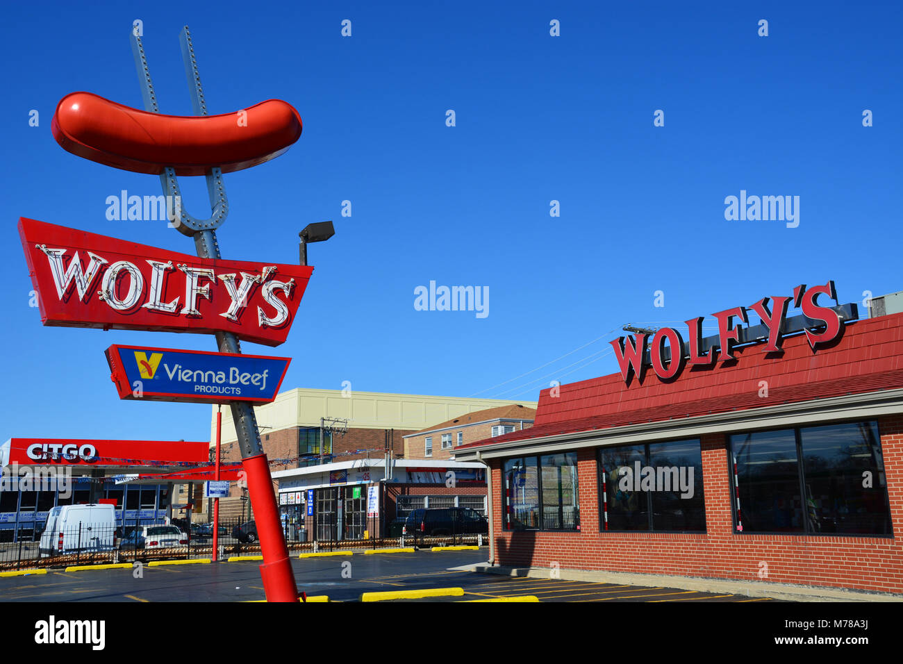 The iconic sign for Wolfy's hot dog stand in Chicago's far north side West Ridge neighborhood. Stock Photo