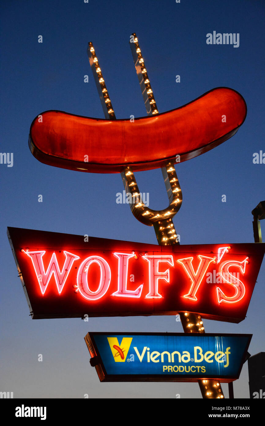 The iconic sign for Wolfy's hot dog stand in Chicago's far north side West Ridge neighborhood. Stock Photo