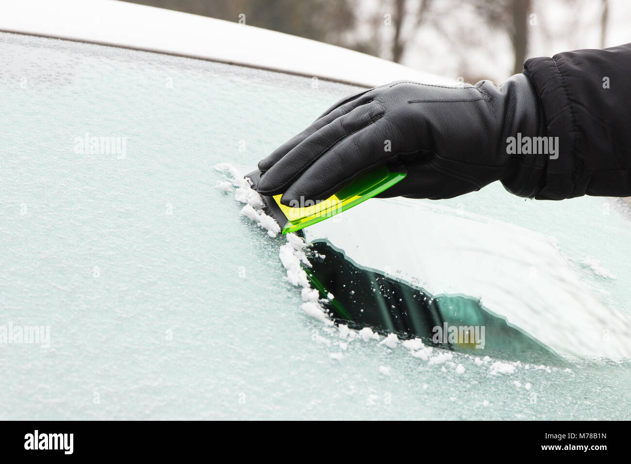 Hand Scratching Ice From Car Window Stock Photo - Download Image
