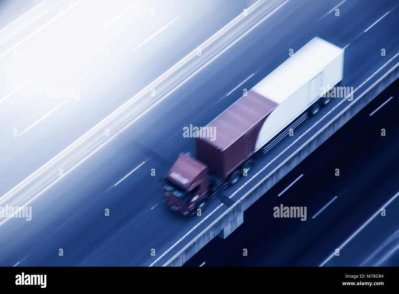 Truck on highway motion blur Stock Photo - Alamy
