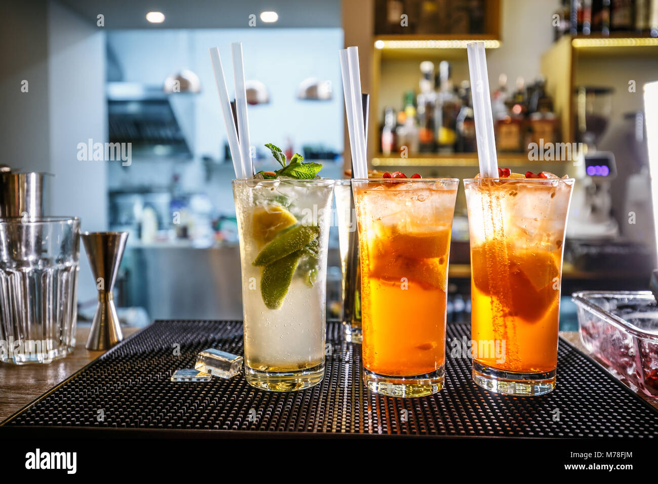 Three non-alcoholic cocktails on the bar counter Stock Photo