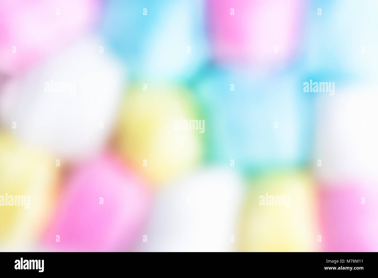 Pattern from Multicolored Cotton Sugar Candy Balls in Checkered Order. Blurred Colorful Background with Copy Space. Fun Kids Birthday Party Celebratio Stock Photo