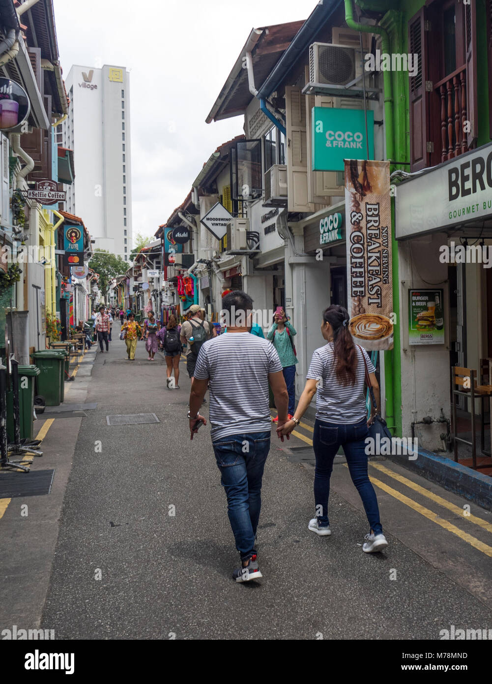 Asian couple holding hands hi-res stock photography and images - Alamy