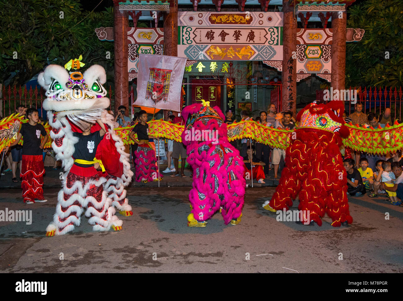 Participants in a Lion dance during the Mid autumn festiaval in Hoi An
