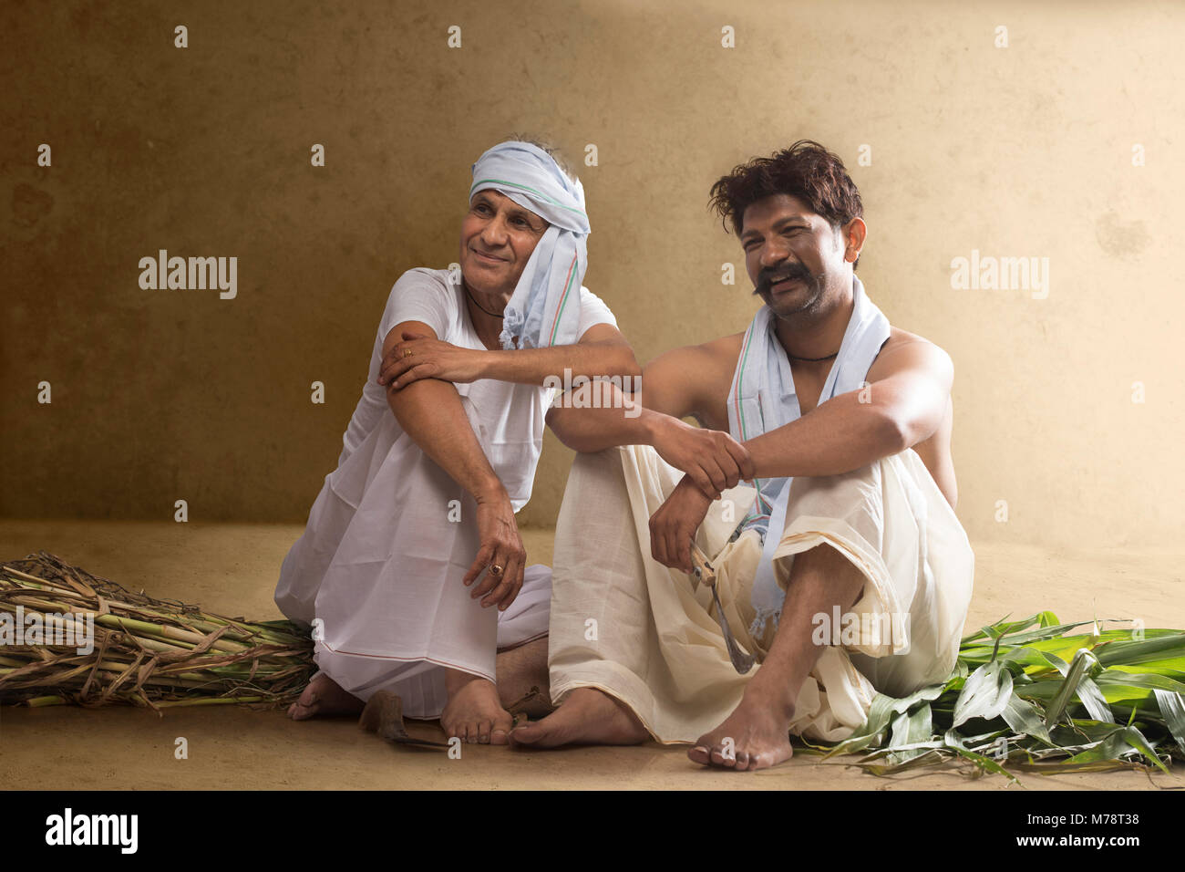 Two Indian farmer sitting together Stock Photo