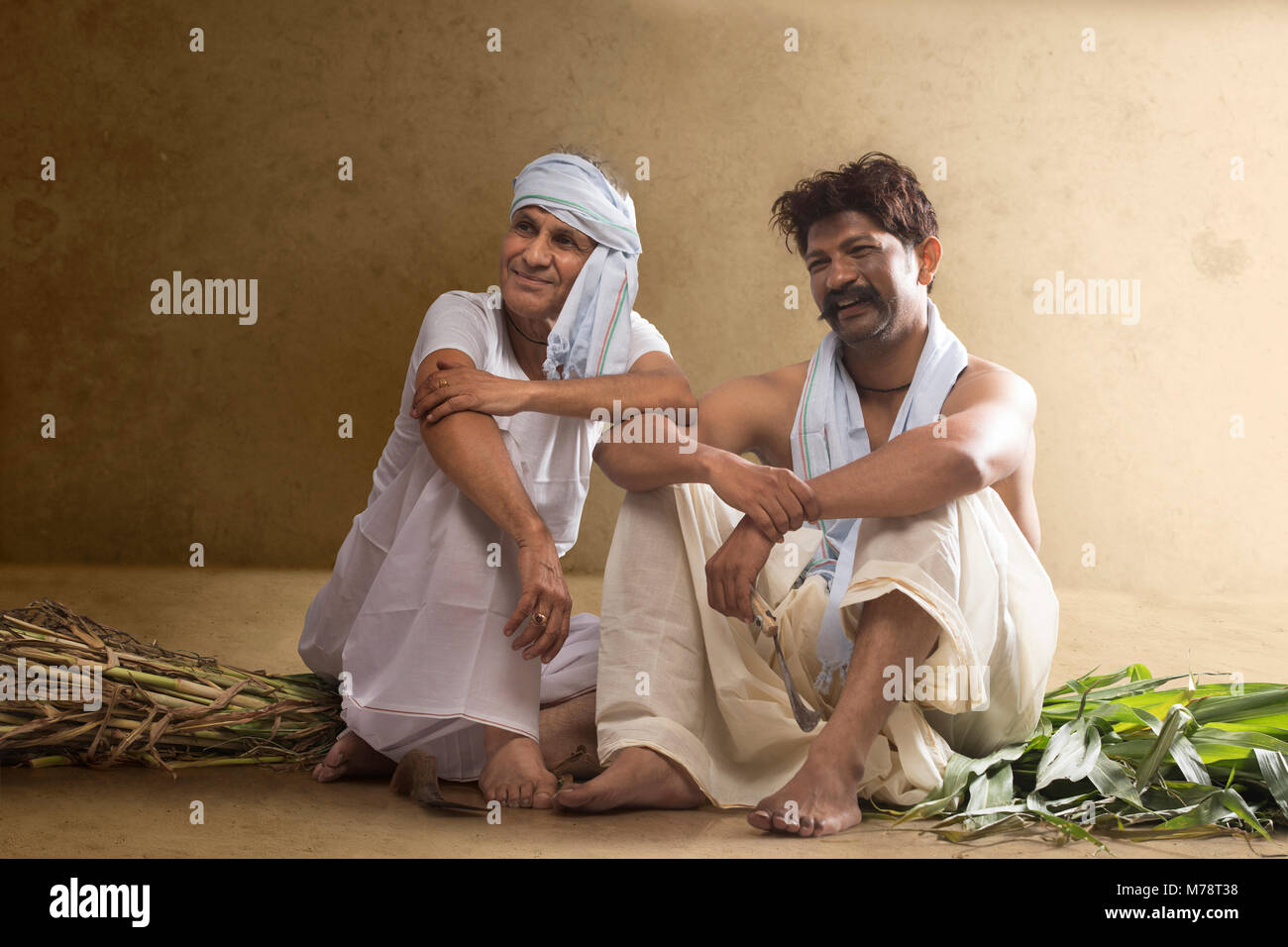 Two Indian farmer sitting together Stock Photo - Alamy