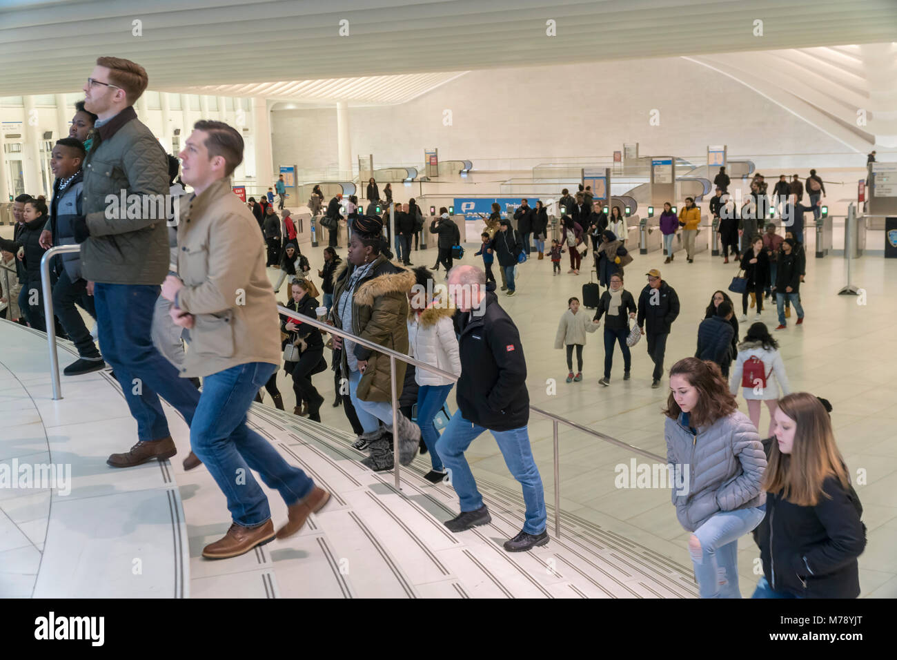 Armies of commuters exit the PATH station and travel through the World Trade Center Transportation Hub on Saturday, March 3, 2018.  (© Richard B. Levine) Stock Photo