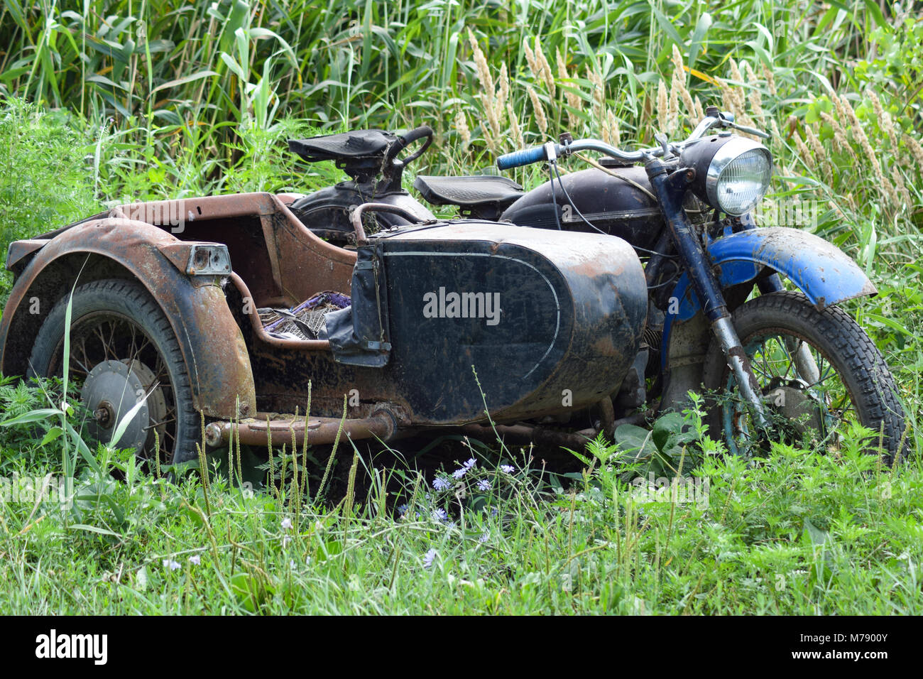 Old Soviet motorcycle with a cradle. An old moto technique Stock Photo -  Alamy