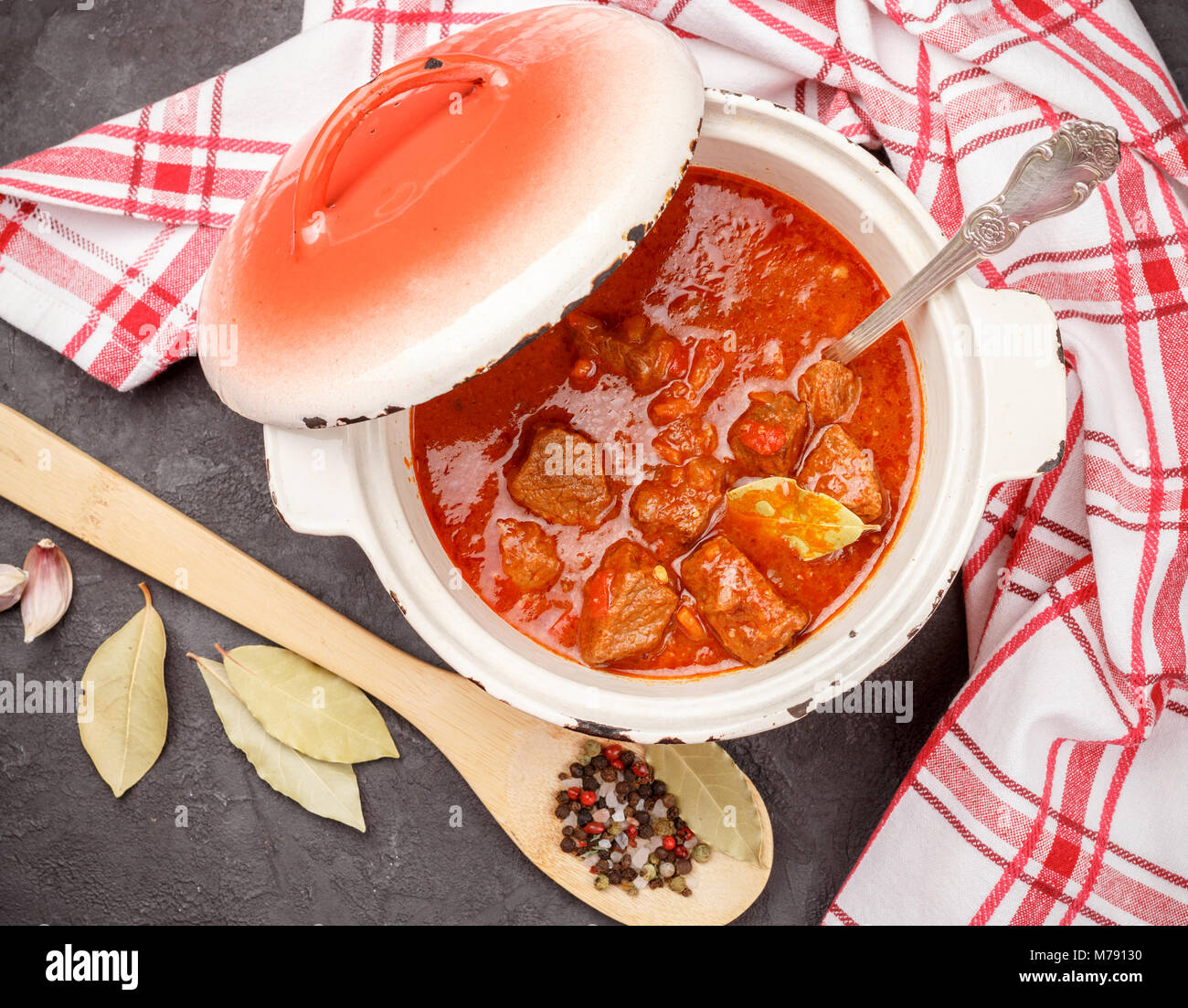 Goulash is a traditional Hungarian dish of stewed beef with vegetables in a thick tomato sauce