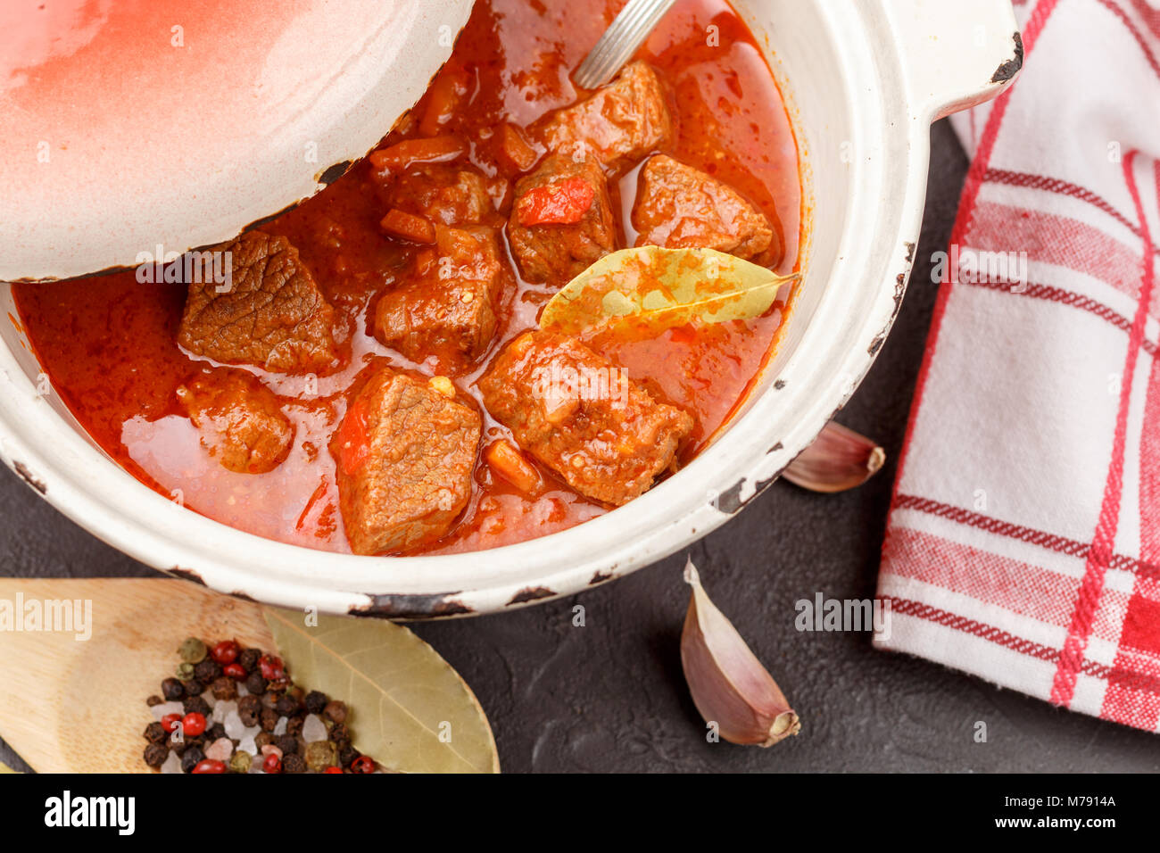 Goulash is a traditional Hungarian dish of stewed beef with vegetables in a thick tomato sauce