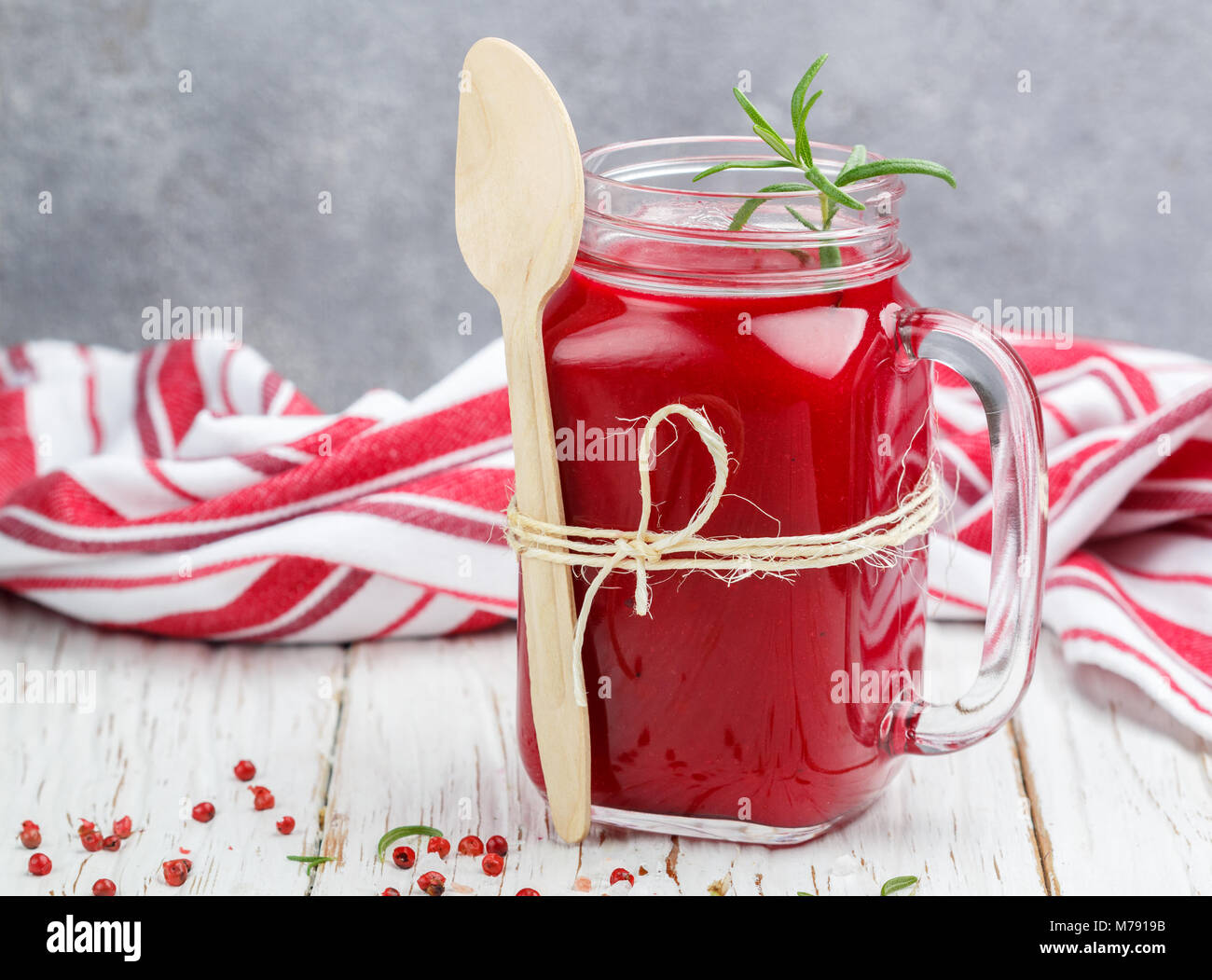 Cold beet soup puree with rosemary in a jar Mason. Healthy snack