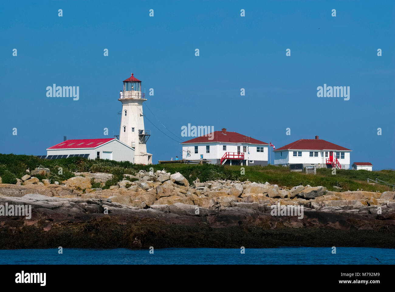 Machias Seal Island lighthouse is the only Canadian lighthouse manned by two keeper’s on the East Coast. Keepers each have their own building. Stock Photo