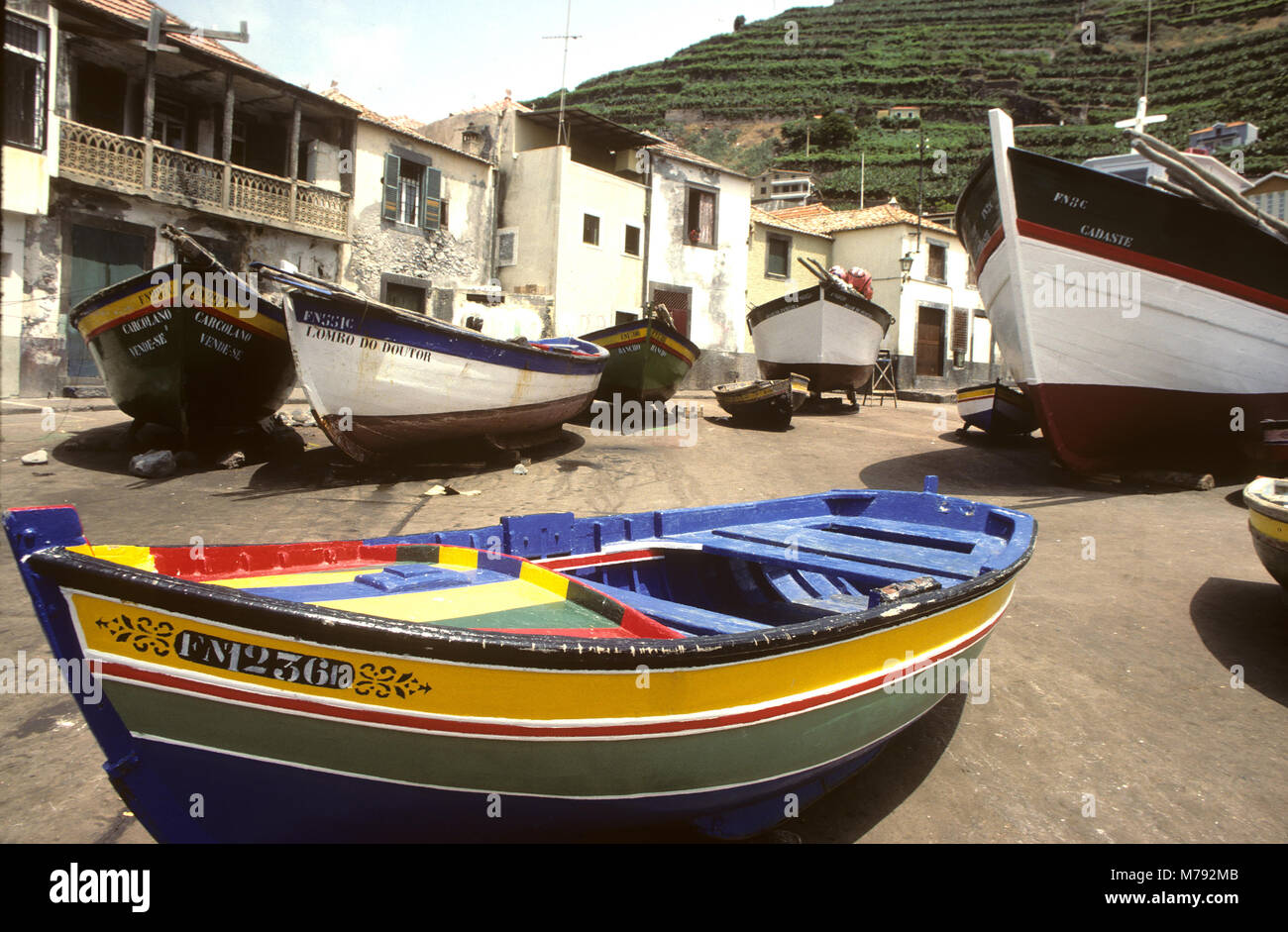 Fishing boats at the ready in the courtyard of a  Camara de Lobos fishing village on the Island of Madeira, Portugal Stock Photo