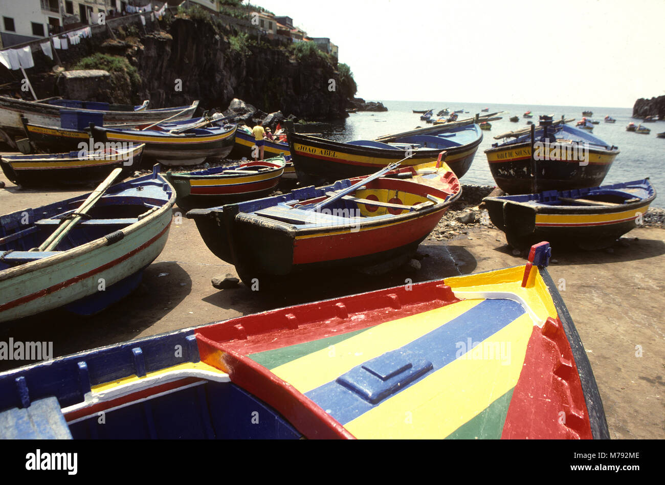 Fishing boats at the ready on the beach of Carmara d Lobos,  a fishing village on the Island of Madeira, Portugal Stock Photo