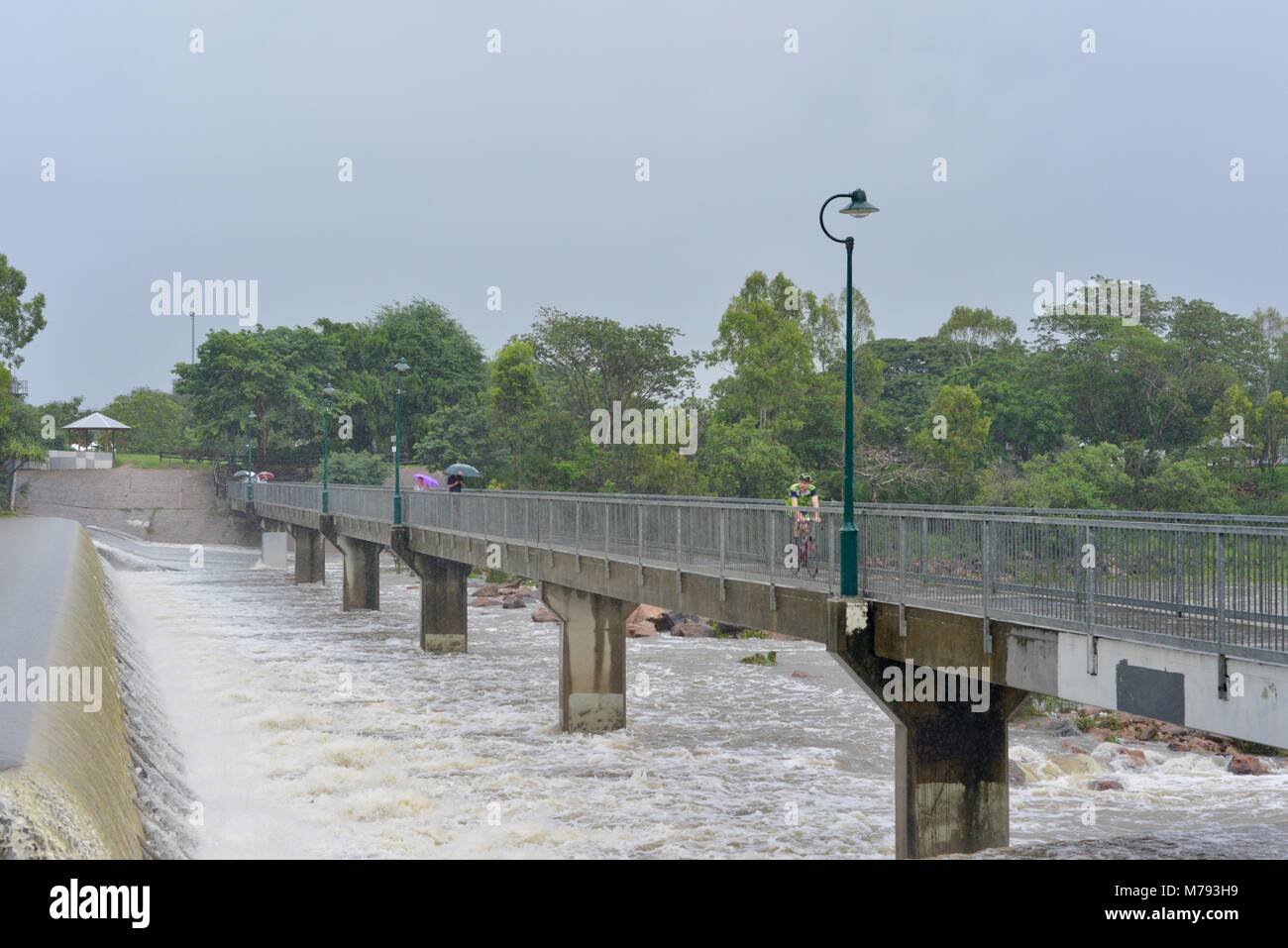 People come to see water cascading over Aplins weir after storms and