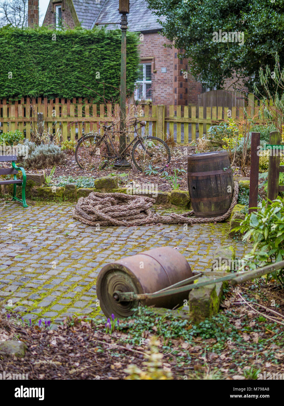 UK Warrington Walton Gardens bicycle garden furniture Stock Photo Alamy