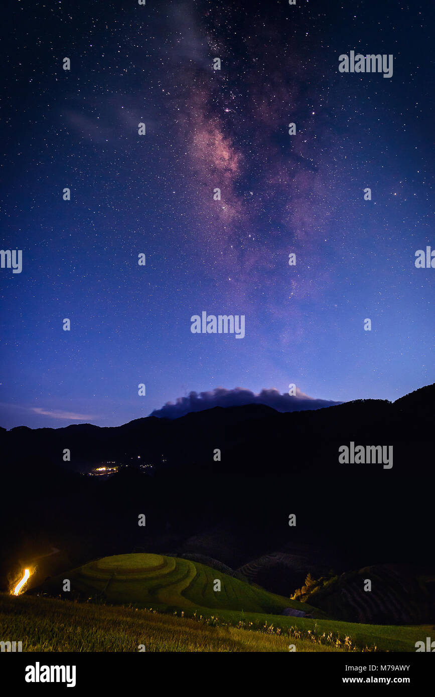 Landscape with Milky way galaxy over Rice fields on terraced in Mu Cang Chai, Vietnam. Night sky with stars. Long exposure photograph. Stock Photo