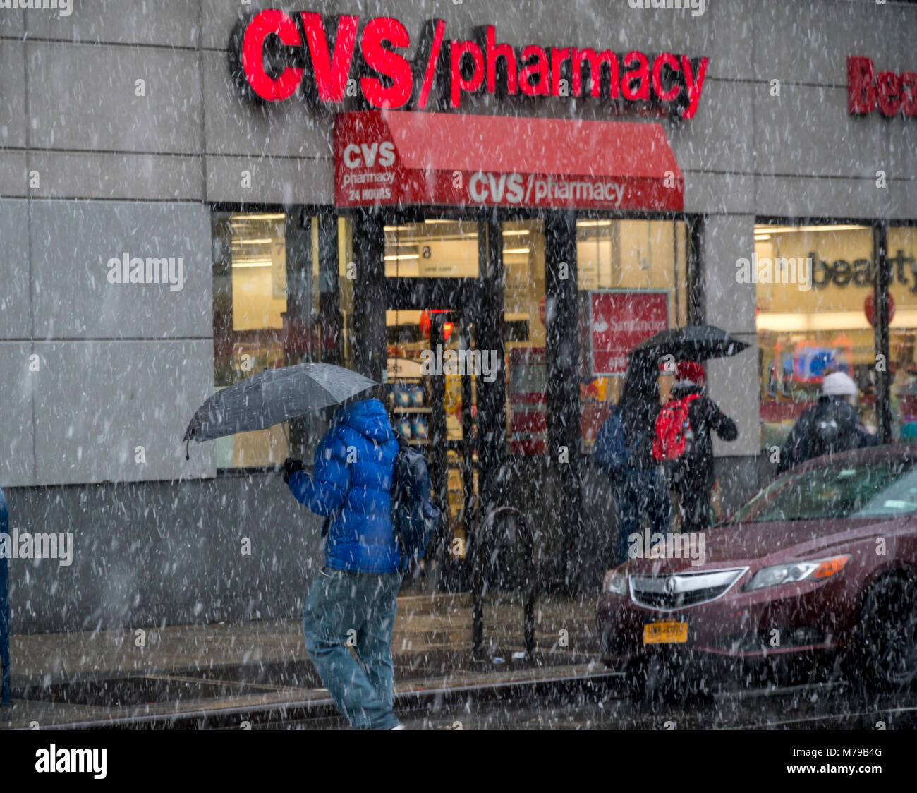 A store in the CVS Health drugstore chain in New York on Sunday, January 21, 2018 is seen during a winter "snowpocalypse". CVS Health's acquisition of Aetna Corp. is affecting its bond rating as the drugstore chain is acquiring $40 billion in new debt. (Â© Richard B. Levine) Stock Photo