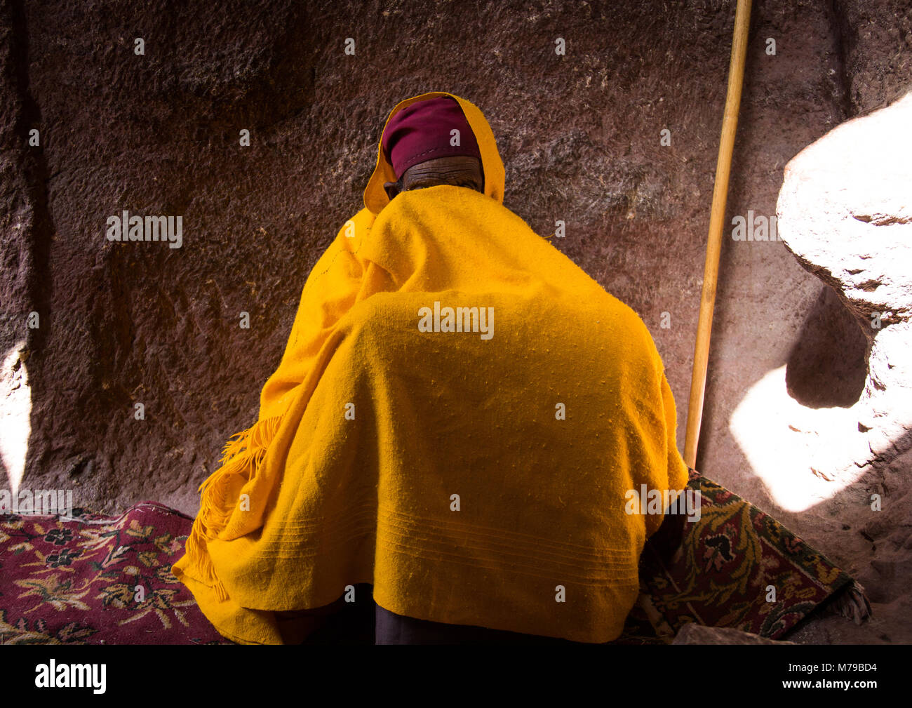 Ethiopian female monk praying in bet medhane alem, Amhara region, Lalibela, Ethiopia Stock Photo