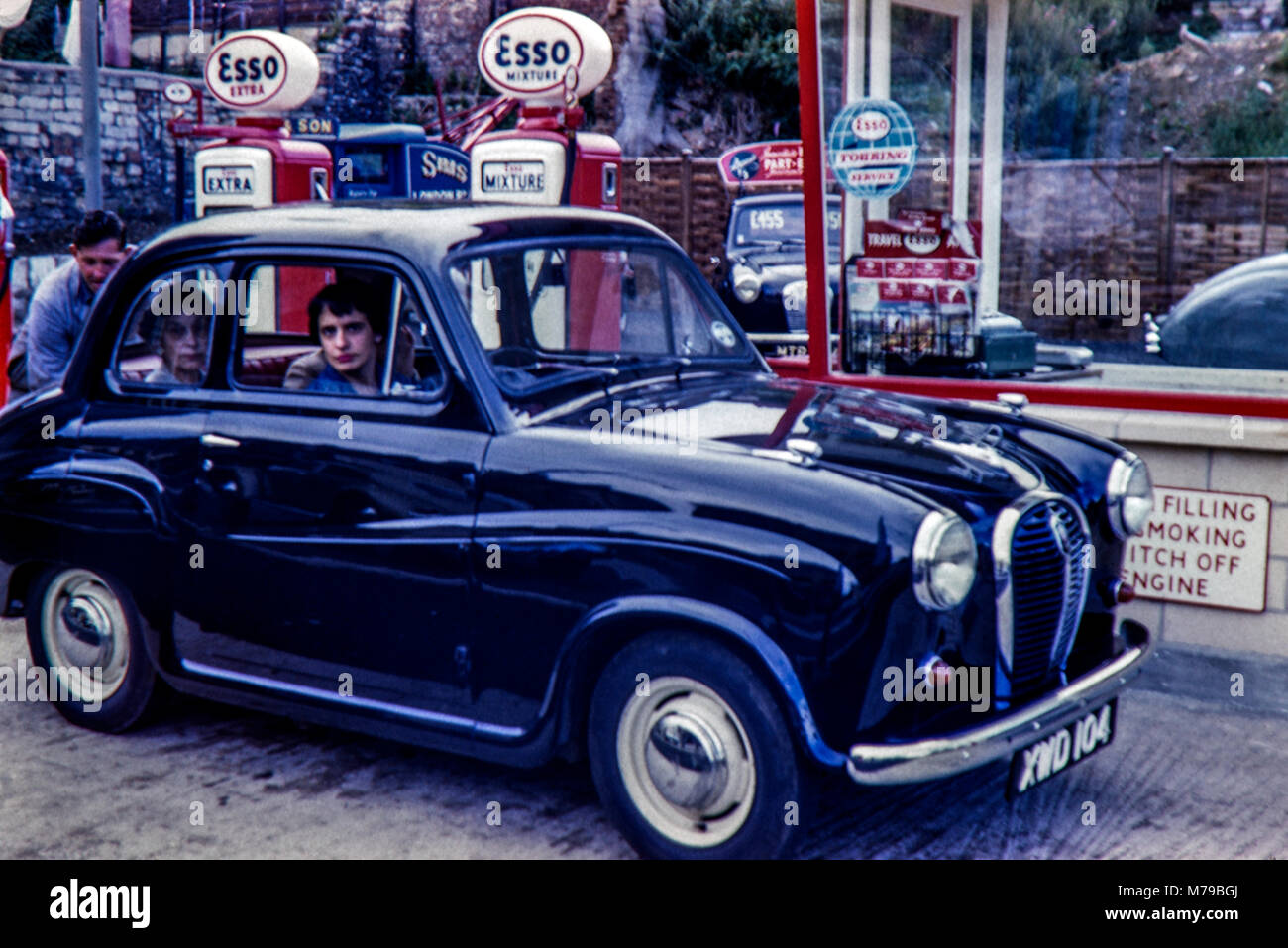 Austin A30 or A35 being refuelled at an Esso filling station in 1958 Stock Photo
