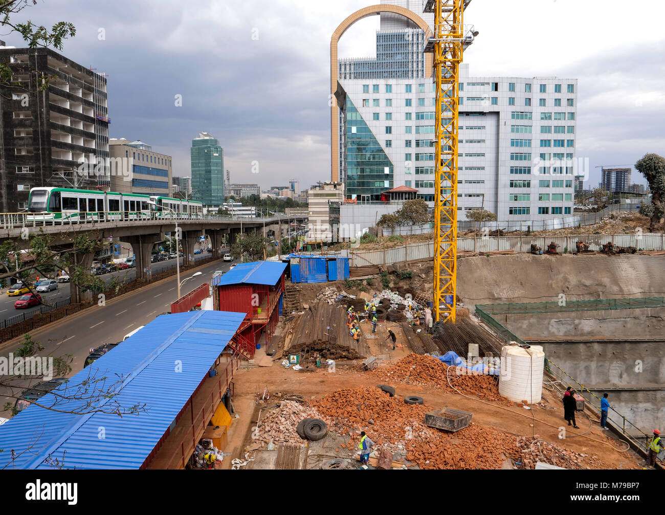 ETHIOPIA , Addis Ababa, LRT Light rail transport, green line, build by chinese company and building constrution site of CJIC China Jiangxi Corporation for International Economic & Technical Cooperation, builds the embassy of Equatorial Guinea and the POESSA Headquarters Stock Photo