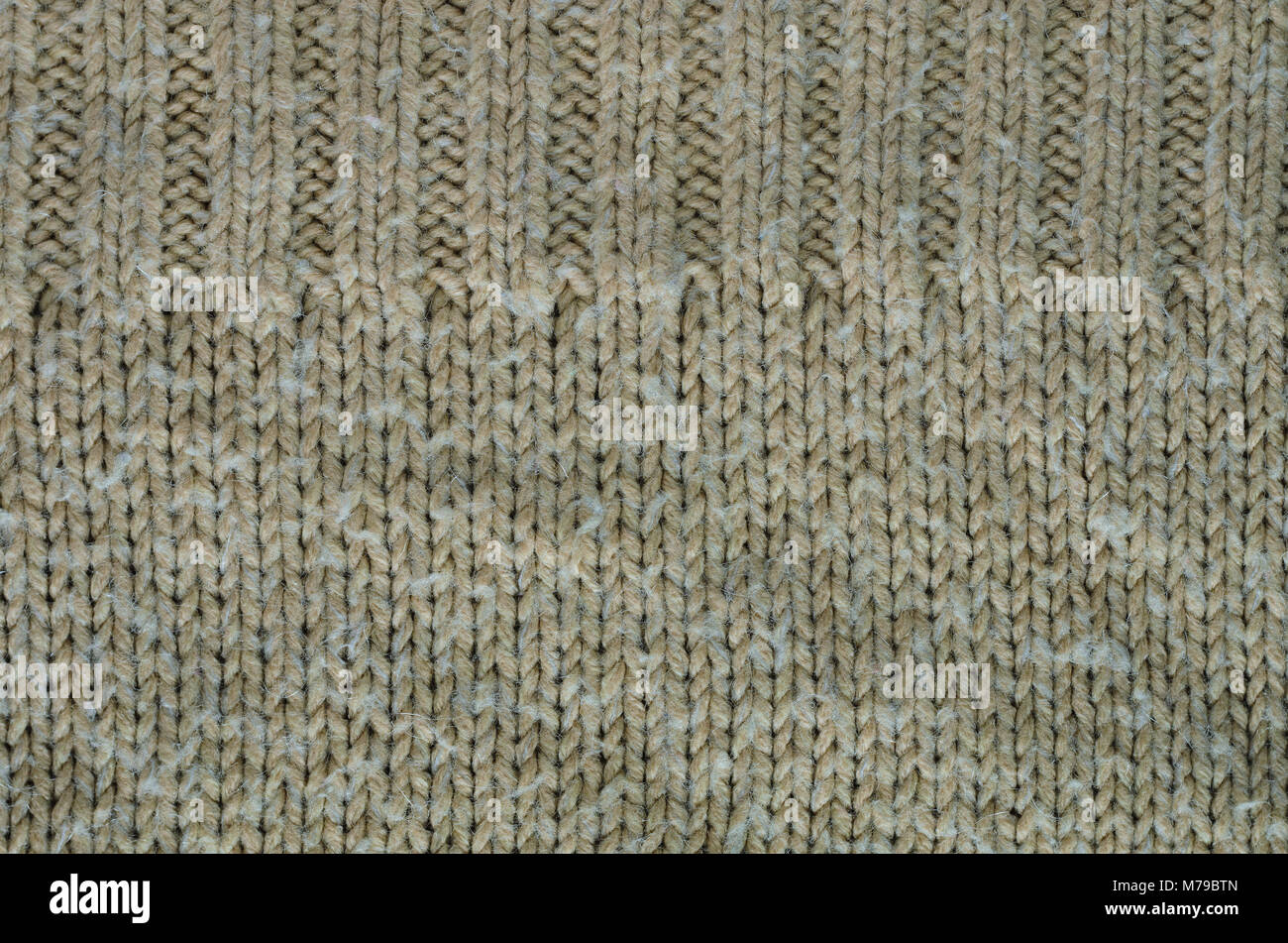 Gray Texture Of A Knitted Sweater With Two Types Of Knitting