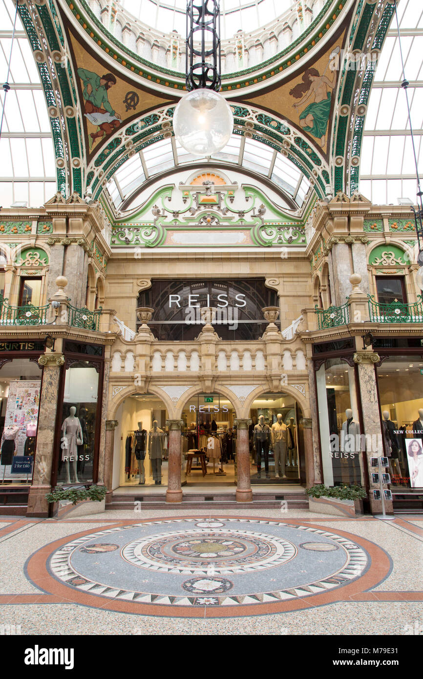 Store in the County Arcade shopping gallery in Leeds, UK. The restored Victorian shopping centre is part of the city's Victoria Quarter. Stock Photo
