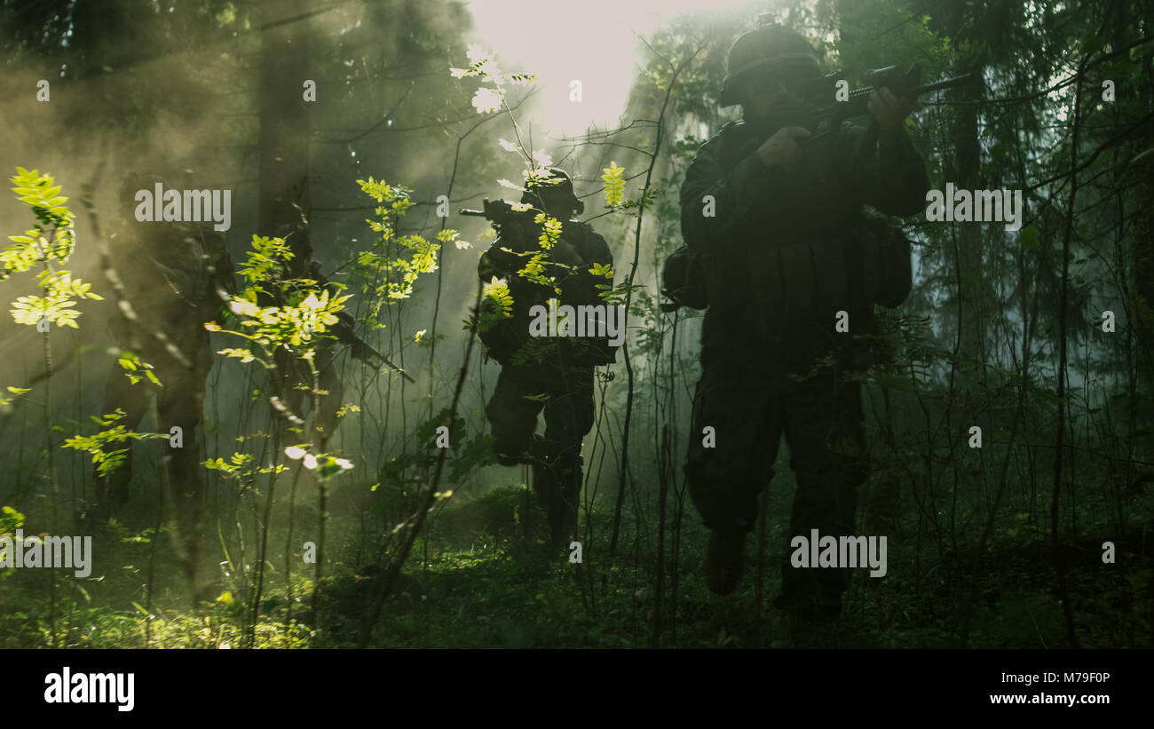 Fully Equipped Soldiers Wearing Camouflage Uniform Attacking Enemy ...