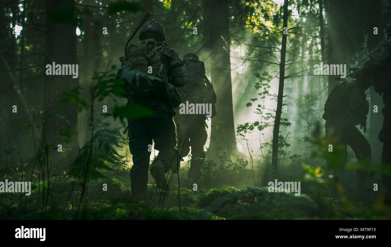 Fully Equipped Soldiers Wearing Camouflage Uniform Attacking Enemy