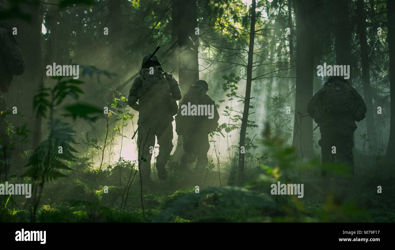 Fully Equipped Soldiers Wearing Camouflage Uniform Attacking Enemy ...