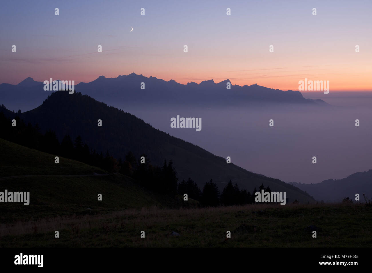 Moonrise, view of the Dent du Jaman, Vaud, Switzerland, Stock Photo