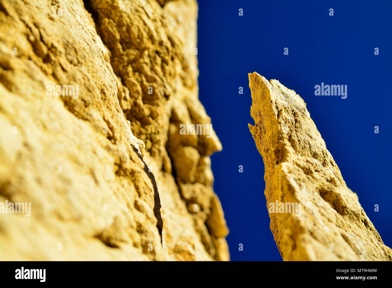 Piece of rock nearly falling in Lagos (Portugal) Stock Photo