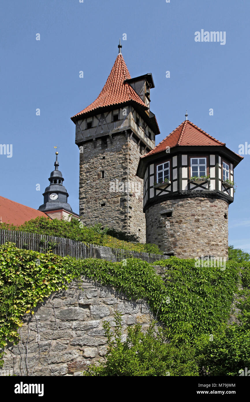 Germany, Bavaria, Ostheim, district Rhön-Grabfeld, Lower Franconia, on the left: Guardian tower or Kißling tower or prison tower, on the right: Waag bell tower, steeple, defensive walls of the church castle, Stock Photo