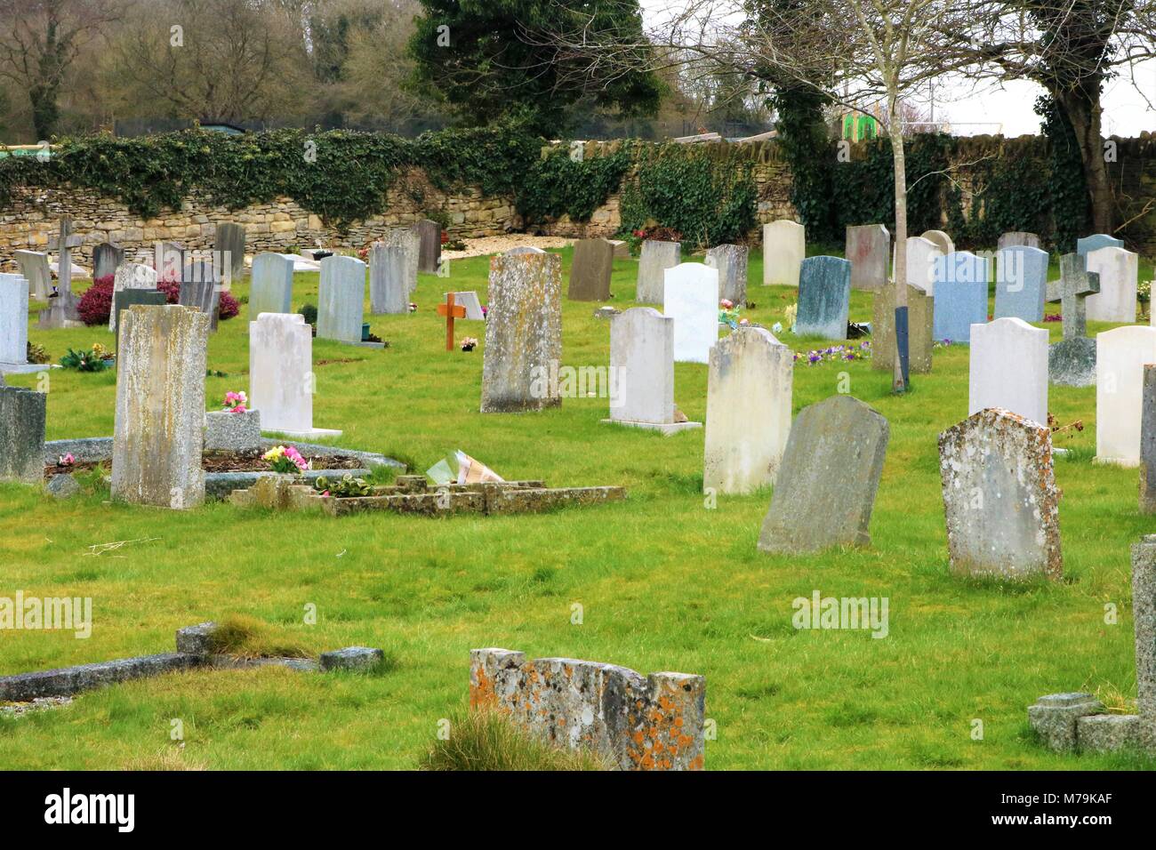 Headstones in a graveyard in Oxfordshire, UK Stock Photo
