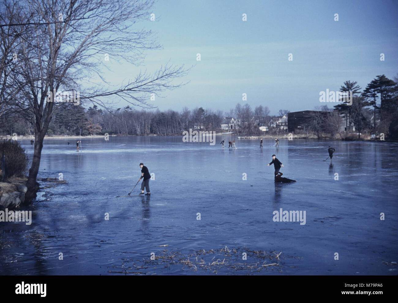 Group of people Ice Skating, Brockton, Massachusetts, USA, Jack Delano for Farm Security Administration - Office of War Information, December 1940 Stock Photo