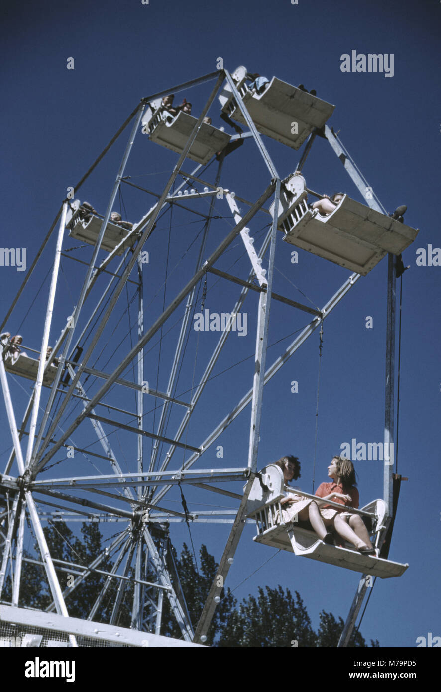 Group of People on Ferris Wheel at State Fair, Rutland, Vermont, USA, Jack Delano for Farm Security Administration - Office of War Information, September 1941 Stock Photo