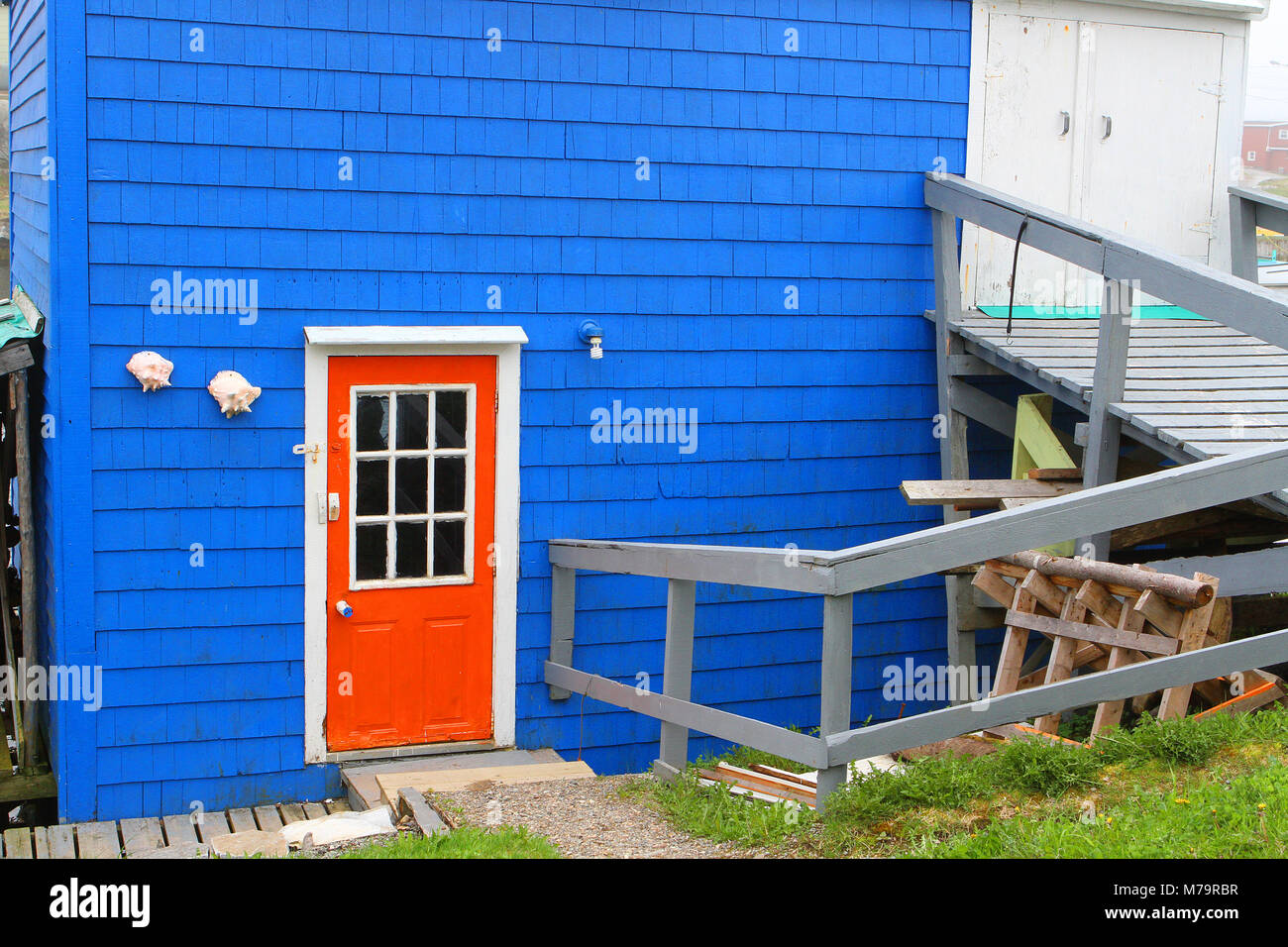 Entryway Orange Door With Blue Walls