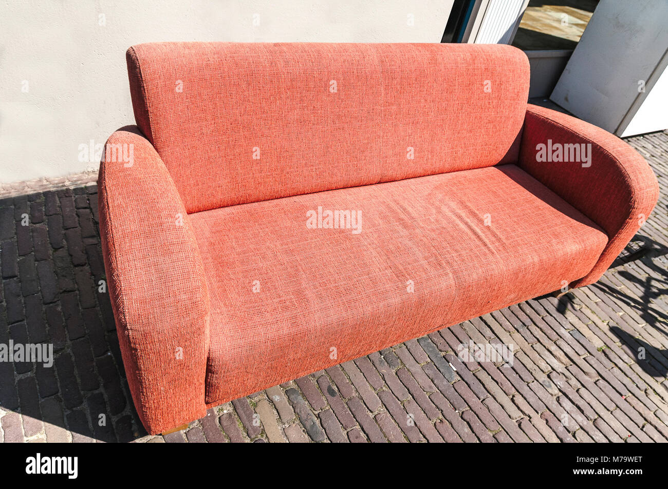 Modern interior orange sofa hires stock photography and images Alamy