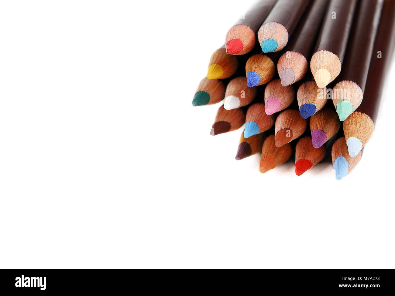 Color pencils with space for text, white background. Texture wood