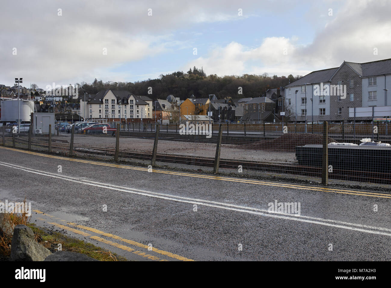 Private and Industrial buildings and railway lines. Oban Harbour, Oban, Argyll, Scotland. 17th February, 2018. Stock Photo