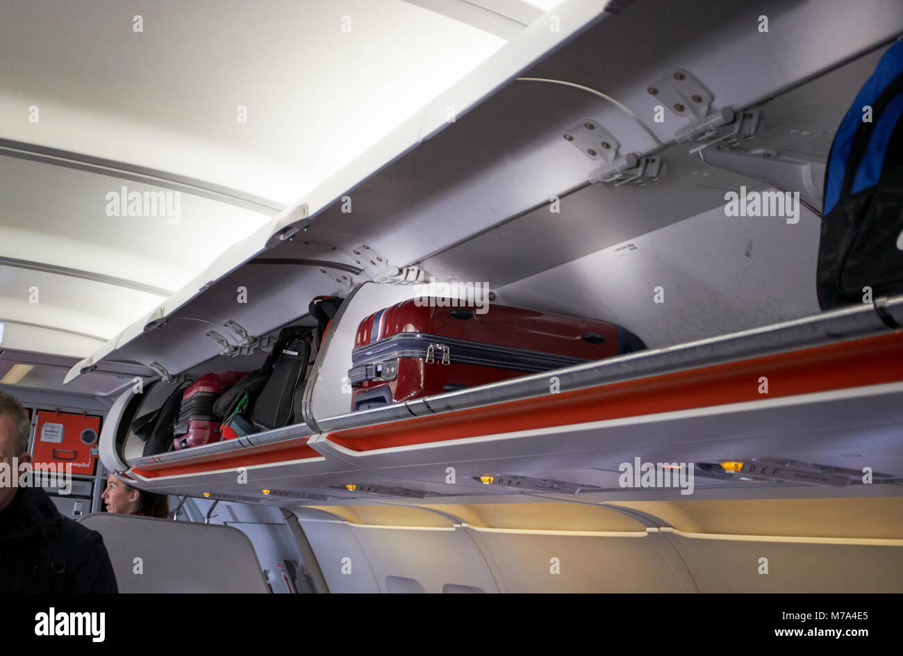 Overhead bins hi-res stock photography and images - Alamy