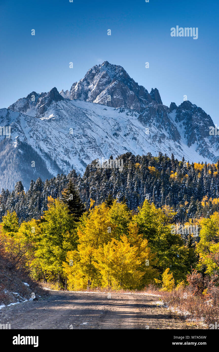 Mount Sneffels under snow, aspen grove in late fall, view from Dallas Creek Road, San Juan Mountains, Rocky Mountains, Colorado, USA Stock Photo