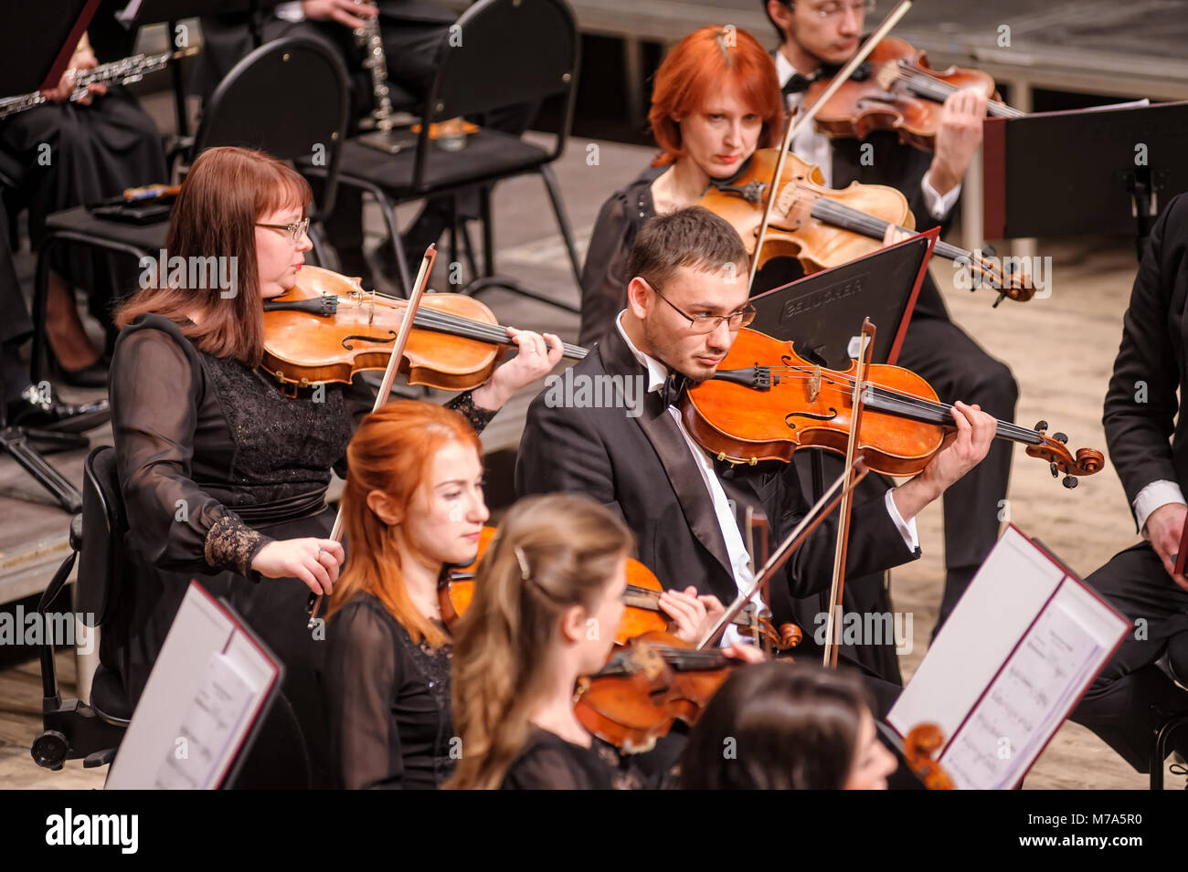 Violin group of orchestra plays Stock Photo Alamy