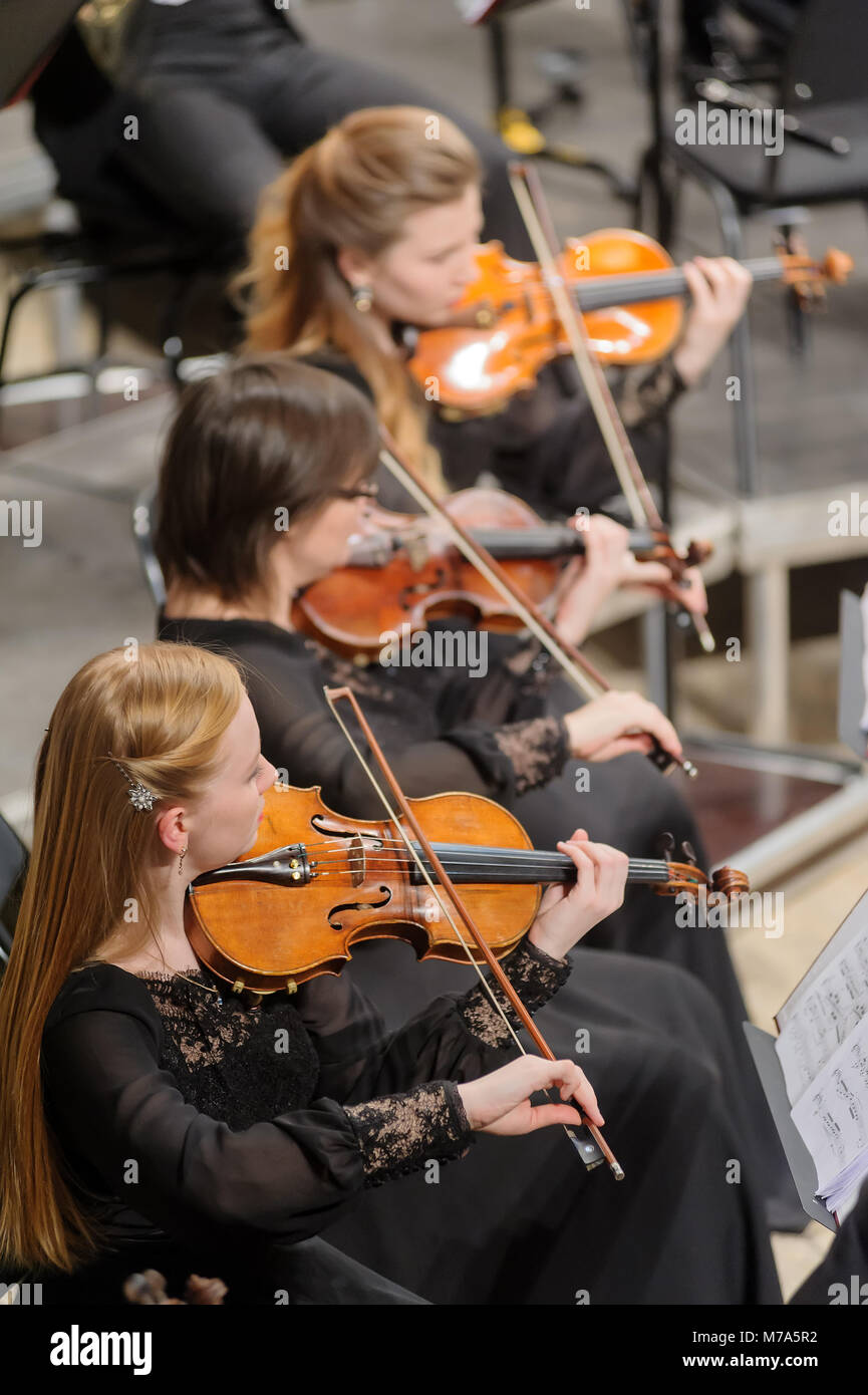 Violin group of orchestra plays Stock Photo Alamy