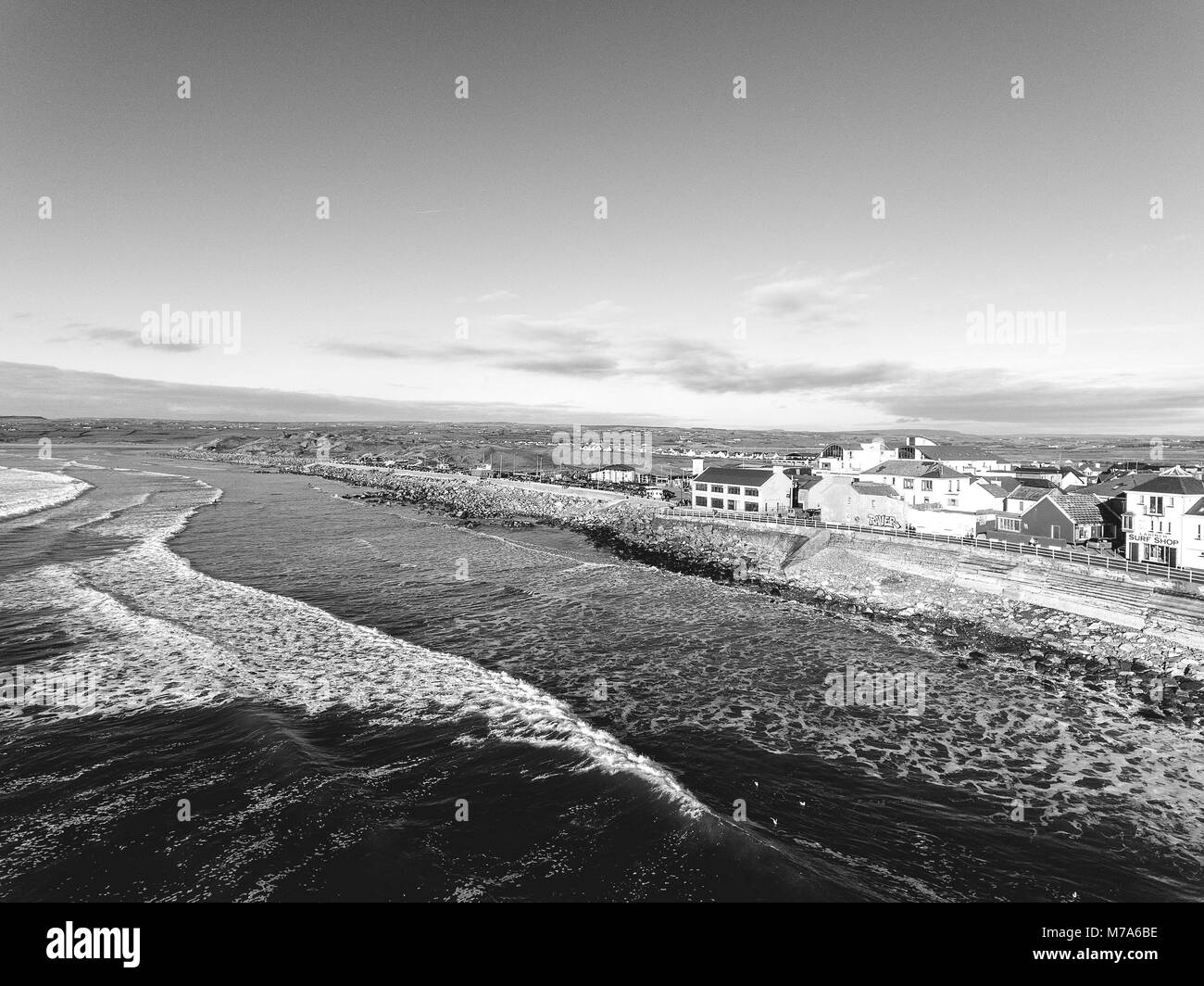 Aerial view of Ireland's top surfing town and beach in Ireland. Lahinch ...